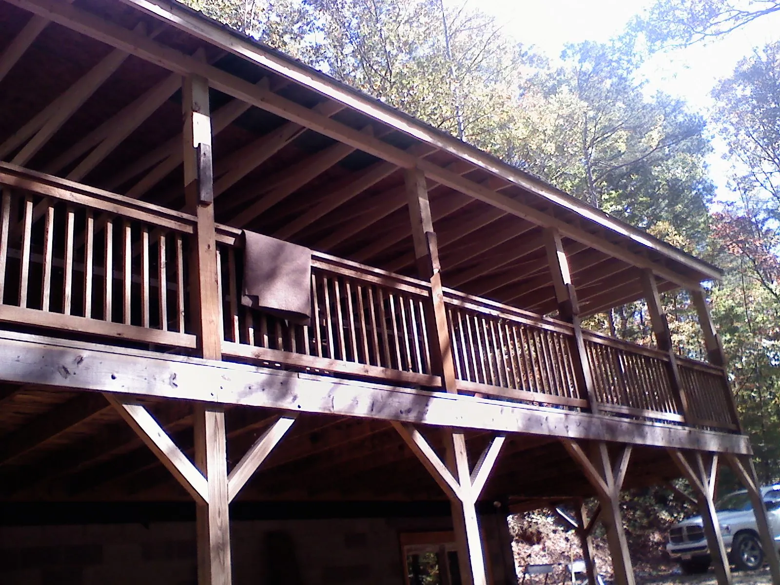Timber framing under a new elevated porch and deck — Roof Leak Repair in Bosque Farms by Roofing Brothers